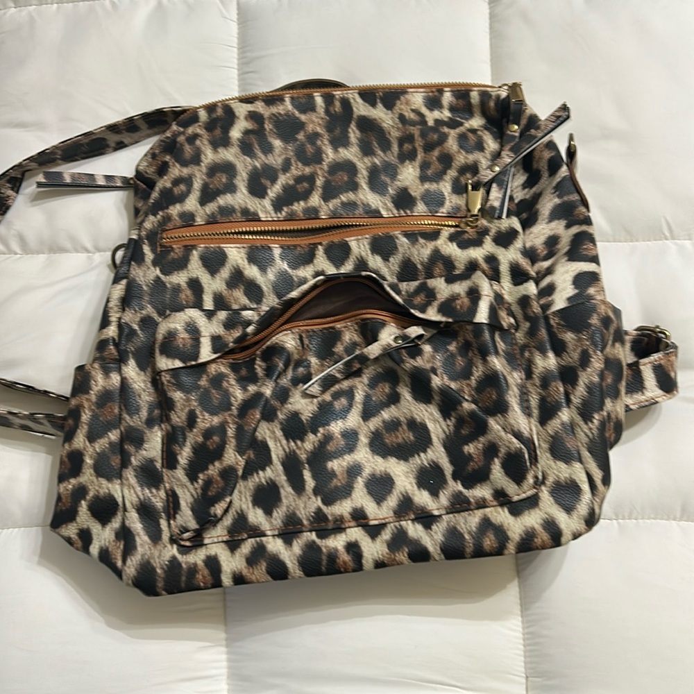 Like new leopard print backpack